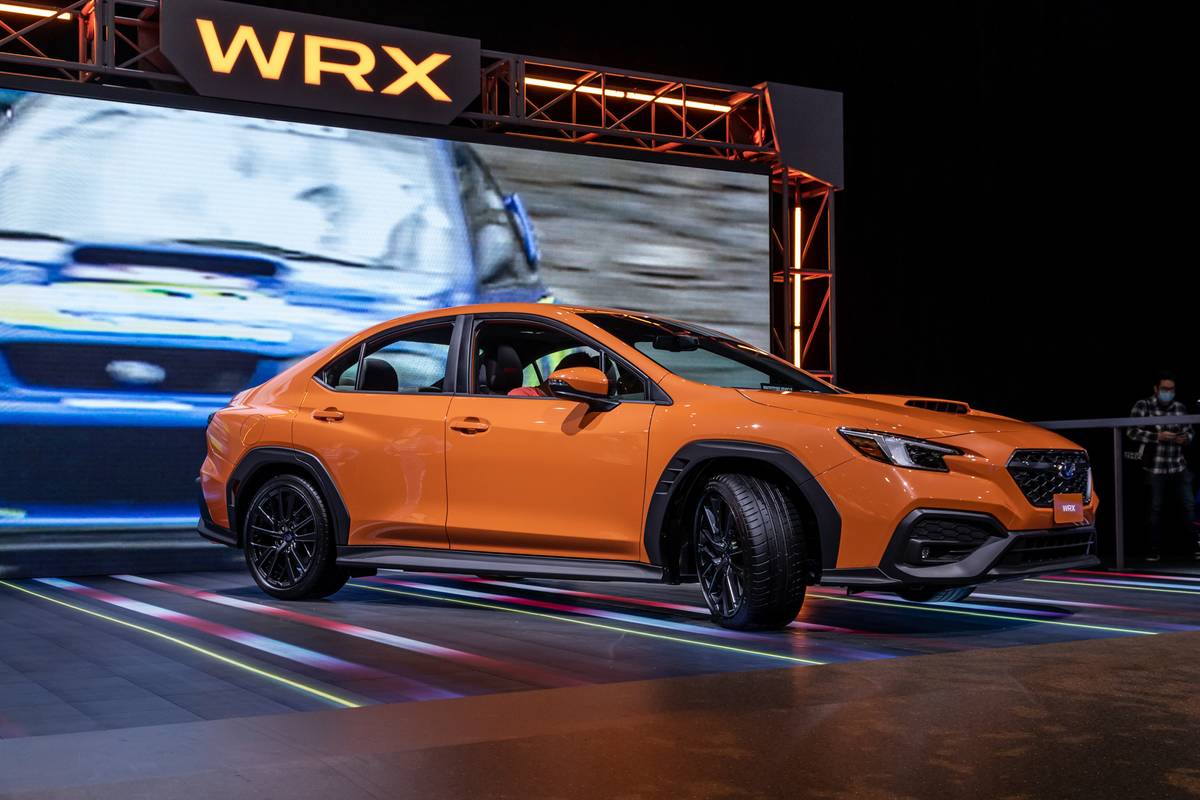Subaru-WRX-2022-02-outside-front-corner-orange-sedan